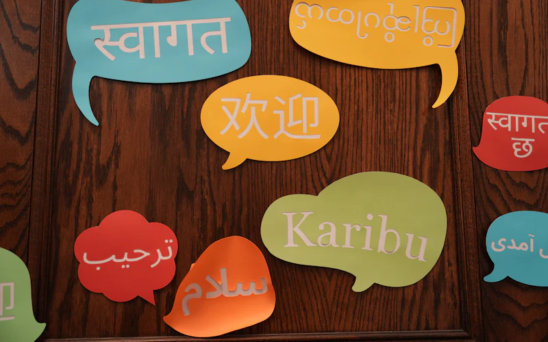 Speech bubble signs showing greetings written in many languages